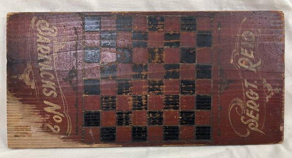 Antique Painted Game Board: Striking antique game board featuring bold red and black painted squares accented with stenciled decoration. Signed Sergt. Reid.Measures approx. 24''H x 11 3/4''W. Some loss to the paint. Shipping