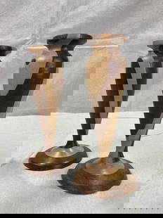 Pair of Marquetry Candlesticks: Urn-shaped forms featuring contrasting light and dark woods inlaid in a striking marquetry pattern. One candlestick missing brass ring insert. Each measures approximately 7 1/2''H. Good overall