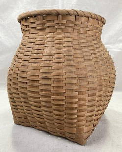 Cherokee Split Oak Wastebasket: Expertly woven Cherokee split oak wastebasket in a classic tapered form, showcasing traditional craftsmanship and clean lines. Measures approx. 13''H x 11''W. Mint condition. Shipping available. 