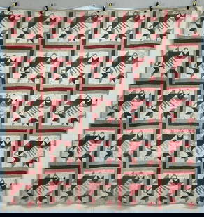 Handmade Turkey Tracks Quilt: This bold and graphic quilt features a traditional Turkey Tracks variation pattern rendered in a warm palette of red, beige, and white. The dynamic block design is framed and unified with red