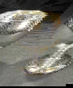 Mercury Glass Goblet: This classic mercury glass goblet features a gently rounded bowl, slender stem, and domed foot, all finished in a bright mirrored silver surface typical of 19th-century pressed and blown mercury