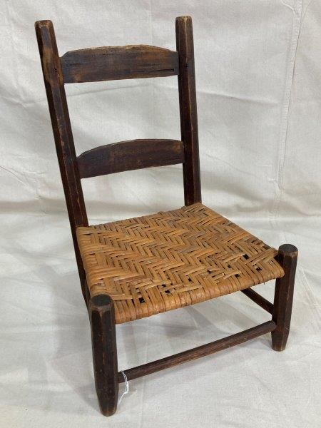 Child's Country Chair with River Cane Seat: Delightful child's country chair featuring shaved posts, shaped splats, and a traditional hand-woven rivercane seat. Measures approx. 22''H x 14''W x 11''D. Good condition with some wear. Shipping ava