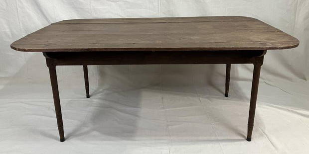 Southern Country Table: Charming Southern country table featuring a multi-board yellow pine top and slightly turned legs. Measures approx. 31''H x 42 3/8''W x 70''L. Some wear to the finish. Shipping available. 