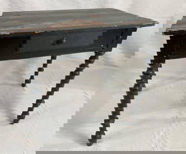 Painted Country Table with Dovetailed Drawer: Charming country table in old black paint with turned legs and a single dovetailed drawer. Displays age-appropriate character with flaking paint and a split in one of the top boards. Measures