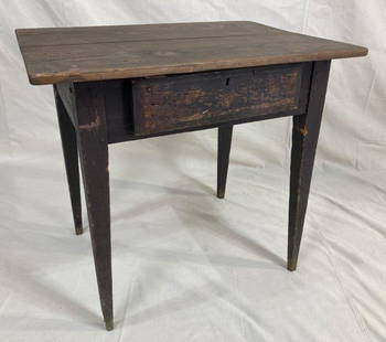 Painted Southern One-Drawer Stand: Crafted from yellow pine with peg construction, featuring a two-board top, tapered legs, and a dark, worn painted surface. Measures approx. 29 5/8''T x 32''W x 23''D. Some wear to the finish.