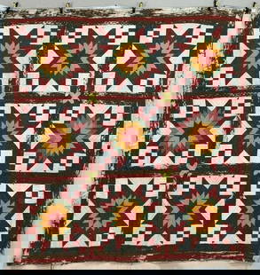 Handmade Star Quilt: Meticulously hand-stitched and centered with a striking eight-pointed star motif, this quilt features vibrant, contrasting fabrics arranged in a bold geometric pattern. Quilt measures approximately