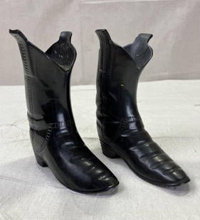 Cowboy Boot Candlesticks: Whimsical pair of modern Western-style candlesticks shaped like cowboy boots, perfect for rustic or themed dÃ©cor. Measures approximately 5 3/8''H. Good condition with minimal wear.