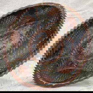 Turned Bowl with Pinecone Decoration: Charming turned bowl featuring painted pinecone motifs encircling the interior rim. Measures approximately 2 1/4''H x 10 5/8'' in diameter. Some wear to the paint. Shipping available. 