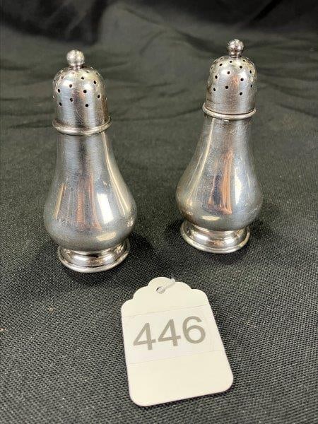 Tiffany & Co. Sterling Silver Salt and Pepper Shakers: Elegant pair of sterling silver salt and pepper shakers by Tiffany & Co., each marked â€œTiffany & Co. 925â€ on the base. Each measures approx. 3''H. Good condition. S