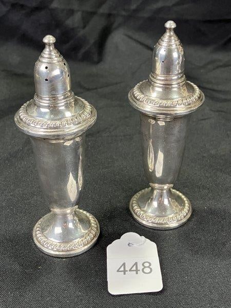 Weighted Empire Sterling Silver Salt and Pepper Shakers: Classic form with elegant proportions. Marked Empire Sterling. Measures approx. 5 1/2''T x 1 1/2'' in diameter. Good condition. Shipping available.
