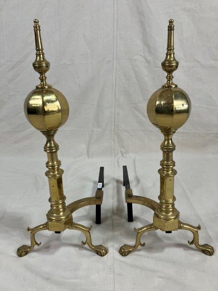 Federal-Style Faceted Brass and Iron Andirons: A striking pair of andirons in polished brass and iron, featuring faceted cannonballs and classic branch feet. Crafted in the Federal style with impressive scale and presence. Each measures approximat