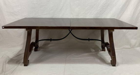 Spanish Style Trestle Table: Handsome trestle table with bold lines and a rich finish, showcasing traditional Spanish design elements. Includes one leaf for extended seating. Measures approx. 28 1/2''T x 38''W x 78''L, Leaf 18