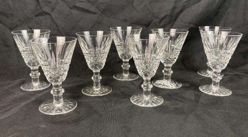 Set of Eight Waterford Crystal Tramore Wine Glasses: A refined set of eight Waterford white wine glasses in the elegant Tramore pattern. Each glass showcases the brilliant clarity and signature cut detailing characteristic of Waterford crystal, offering