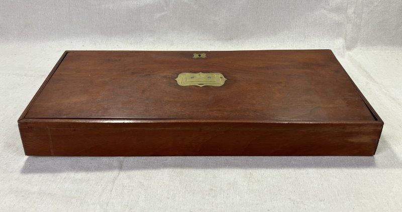 19th Century Walnut Box: A finely crafted 19th-century walnut box featuring warm wood grain and decorative brass accents. Measures approximately 3 1/8" H x 18 1/4" W x 7 3/4" D. Good condition with minor wear consistent with