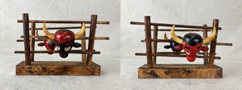 Ucago Bullhead Napkin Corral Holder: Japanese Ucago napkin holder ideal for rustic or western decor, featuring rich red and black tones. Still retains original label. Measures approximately 5 1/4" H x 9" W x 5" D. Intentional wear presen