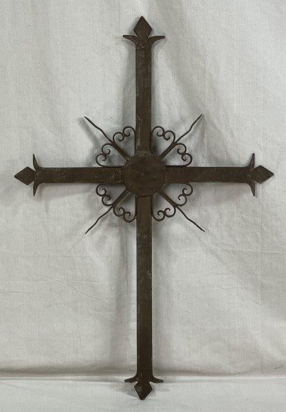 Wrought Iron Cross: Wrought iron cross with weathered patina. Measures approximately 38" H x 25 1/2" W. Good condition.