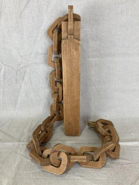 Folk Art Carved Chain: Intricately hand-carved wooden chain, crafted from a single piece of wood. Measures approximately 13 1/8'' L x 1 3/4'' W x 1 3/4'' D. Good condition.