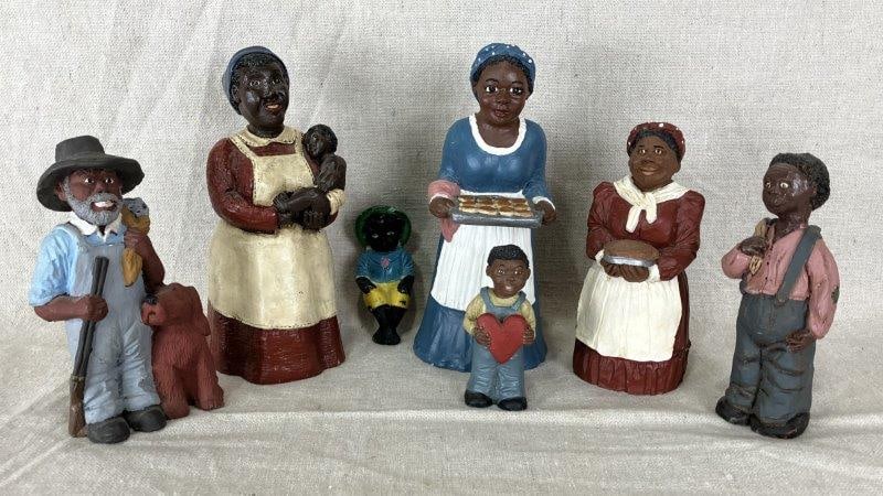 Seven Black Americana Figurines: A charming assortment of African American figures executed in traditional style, including a Dixie Darlin's Aunt Jemima figure, a Kat's Krafts figure, one by artist Janice (1987), and others. Tallest 