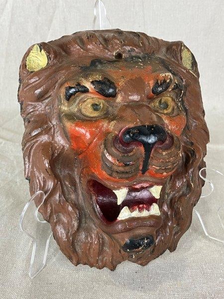 Polychromed Lion Head Sculpture: Wonderful depiction of a fierce lion with bared teeth, featuring detailed hand-painted details throughout in rich reds, warm browns, and soft yellows. Measures approximately 7 1/2" H x 6 1/4" W x 3 3/
