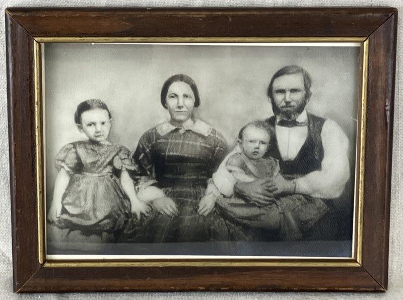Print of 19th Century Family: Charming print depicting a 19th century family. Measures approximately 6 1/8" H x 8 1/8" W x 3/4" D. Good condition with light wear consistent with age.