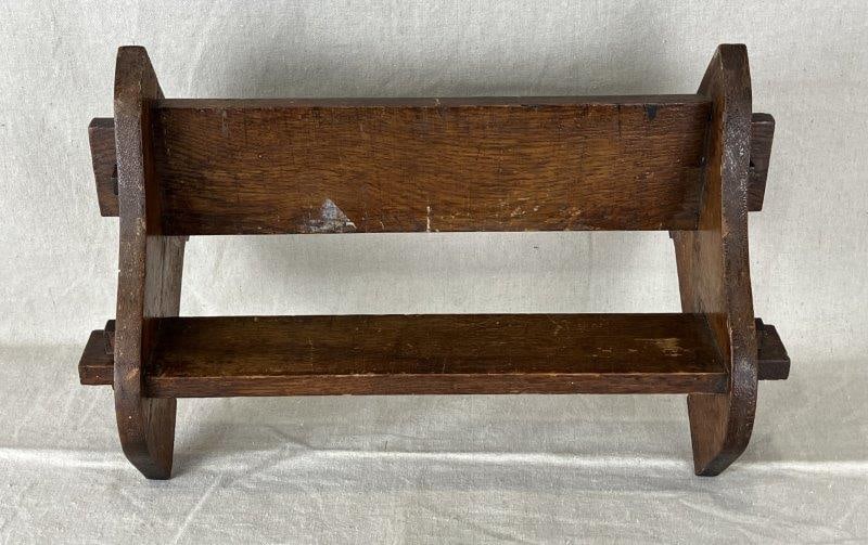 Oak Book Stand: Rich oak patina throughout, ideal for book display and storage, hand-constructed utilitarian form. Measures approximately 8 1/2" H x 16" W x 6 3/4" D. Some wear to varnish and wood finish with minor m