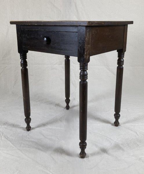 One Drawer Stand: Handsome one-drawer stand with a rich dark patina and finely turned legs, showcasing classic craftsmanship and balanced proportions. Measures approximately 30 1/4" H x 23" W x 21 3/4" D. Some wear and