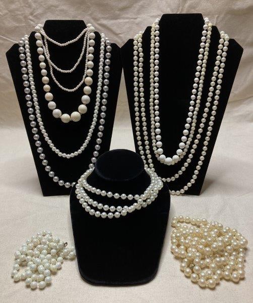 Lot of Vintage Pearl Necklaces: A collection of vintage pearl necklaces in assorted lengths and styles, accented with both goldtone and silvertone details. Wear consistent with age and use.