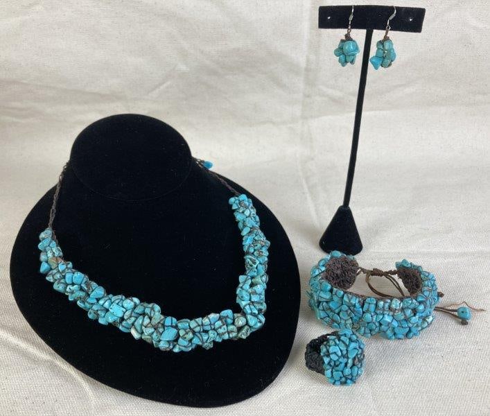 Set of Woven Turquoise Jewelry: A set of woven turquoise jewelry including a pair of earrings, an adjustable bracelet with leather ties, a ring approximately size 7 1/2, and a choker-style necklace. All pieces are in good condition