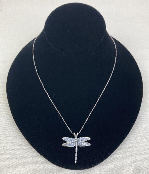 Sterling Silver Dragonfly Pendant Necklace: Sterling silver necklace featuring a finely detailed dragonfly pendant with textured wings and delicate craftsmanship. Pendant stamped 925 on the reverse and measuring approximately 1 1/4" wide by 1 1