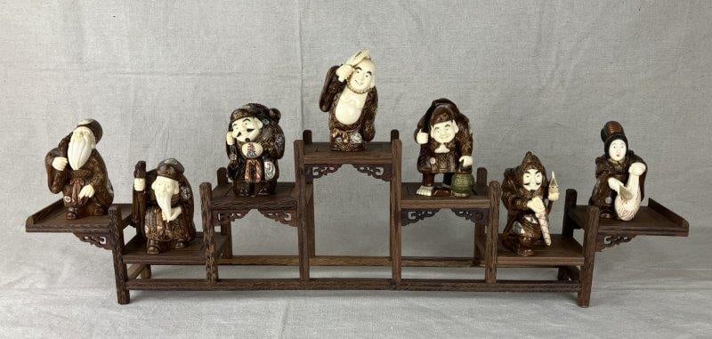 Carved Set of the Seven Lucky Gods (Shichifukujin), Early to Mid-20th Century: A handsome carved set of the Seven Lucky Gods (Shichifukujin), including Daikokuten, Benzaiten, Bishamonten, Fukurokuju, Jurojin, and Hotei. Each figure bears a maker’s mark on the base. Early t