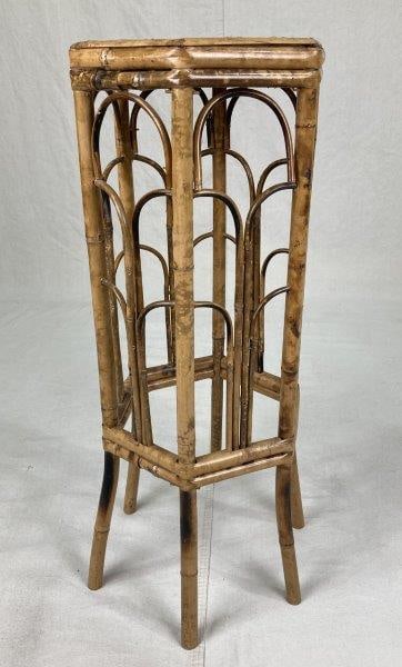 Scorched Bamboo Plant Stand: Charming scorched bamboo plant stand with a hexagonal top, decorative shaped bamboo sides, and six legs. The warm aged patina highlights its period character. Measures approximately 27 3/4'' H x 11 1/
