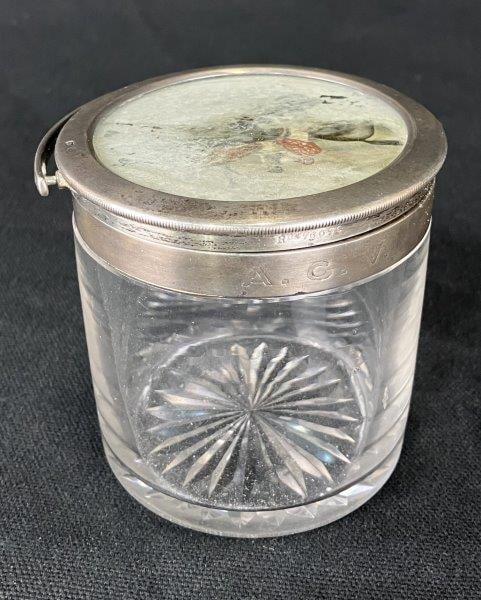 English Sterling Silver Shaving Jar with Equestrian Motif: Elegant English lidded sterling silver shaving jar, the top decorated with a detailed equestrian hunting motif and fitted with a mirror on the underside of the lid. The sterling components are marked