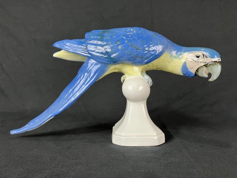 Royal Dux Tropical Blue Macaw Figurine: Engaging and lifelike porcelain figurine of a tropical blue macaw from the notable Royal Dux company, showcasing the maker’s fine attention to naturalistic detail. Provenance: Czech Republic. Me