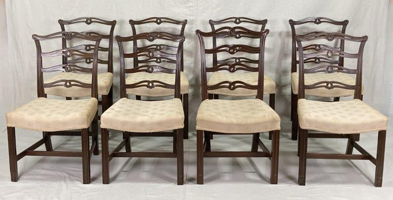 Chippendale Style Ribbon Back Chairs: Set of eight ribbon back chairs in the Chippendale style, each with finely carved splats and upholstered in ivory embossed medallion fabric. The chairs display a warm patina. The largest chair measure