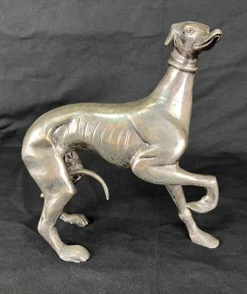 Silver-Washed Brass Greyhound Sculpture: Beautifully cast brass sculpture of a greyhound, enhanced with a silver wash finish. The elegant and graceful form conveys a sense of motion, with finely realized facial features adding lifelike detai