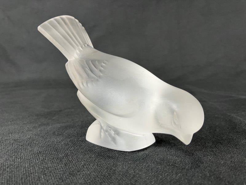 Lalique Frosted Crystal Sparrow Figurine: Elegant frosted crystal figurine of a sparrow, finely modeled in art glass by the notable Parisian maker Lalique. Signed with an inscribed signature on the base. Measures approximately 3 7/8" H x 4 3/