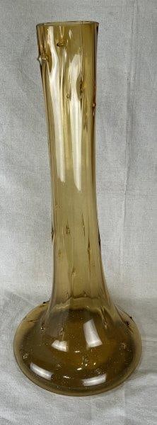 Art Glass Floor Vase: Striking floor vase in rich honey amber tones, hand-crafted with graceful artisan form and strong decorative presence. Measures approximately 27 1/8" H x 11" in diameter. Good overall with minimal chi