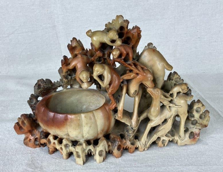 Chinese Soapstone Carving: Intricately carved soapstone sculpture featuring monkeys and a variety of animals in interactive poses, rendered with character and distinction typical of Chinese artistry. Measures approximately 8 1/