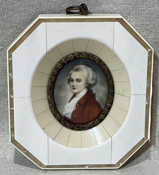 Painted Miniature Portrait, 18th Century Figure: Charming hand-painted miniature portrait depicting a gentleman in 18th-century dress, executed in the traditional miniature style and housed in a bone frame with gilded and mother-of-pearl details. Fr