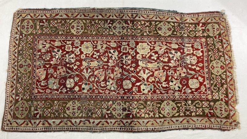 Early 20th Century Mahal Rug: The field displays an allover floral lattice design with intertwining vines, stylized palmettes, rosettes, and leaves, characteristic of Persian Mahal weaving traditions. Measures approximately 48'' x