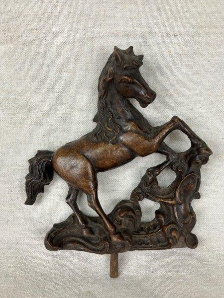 Horse Sculpture: Expressive sculpture of a horse rendered with a brushed wood finish, capturing a sense of movement and careful attention to detail in its form. Measures approximately 7 1/2" H x 6 1/2" W x 2" D and is