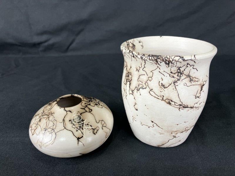 Pair of Horsehair Native American Pottery Vessels: Pair of Native American pottery vessels, including one inscribed “Deer Dancer” with a signature, both created using the horsehair firing technique that produces unique linear patterns. Fin
