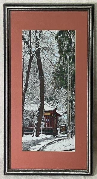 Japanese Winter Landscape Embroidered Tapestry: Finely executed embroidered tapestry depicting a domestic space set within a scenic wintry landscape, rendered with vibrant stitching and intricate detail. Presented in a silver frame that complements
