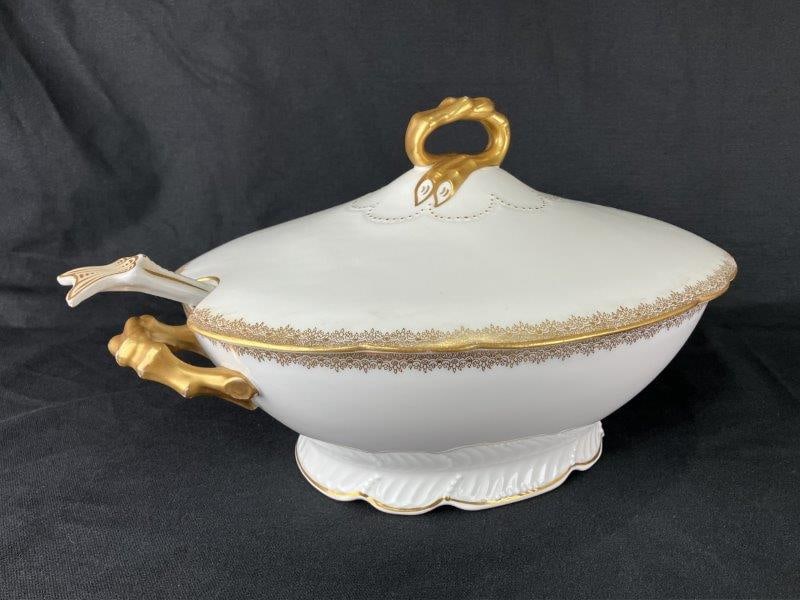 Jean Pouyat Limoges Porcelain Tureen with Serving Spoon: Elegant porcelain tureen with serving spoon by Jean Pouyat Limoges, France, marked on the base. Produced likely between 1905 and 1932, prior to the companyâ€™s acquisition by Guerin L