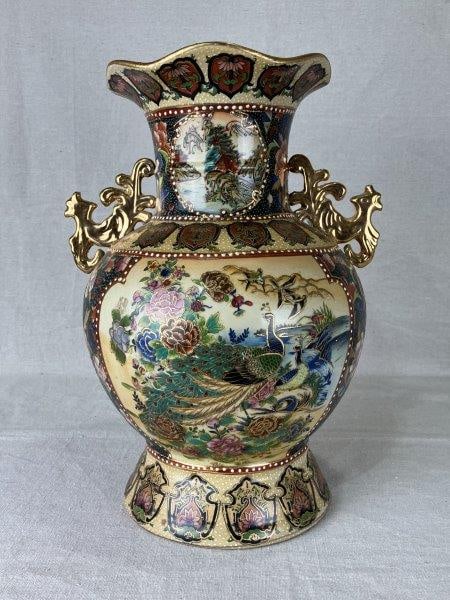 Japanese Satsuma Peacock Vase: Traditional style Satsuma vase with a classic form and textured surface, richly decorated with ornate gilding. Central panels depict elegant peacocks surrounded by finely detailed embellishments, show