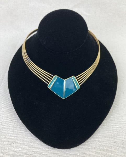 Trifari Gold-Tone Torque Necklace with Green Enamel Center: Elegant Trifari vintage gold-tone torque necklace featuring a central green enamel accent framed by sculptural gold wire detailing. A refined example of Trifari's timeless mid-century design. Measures