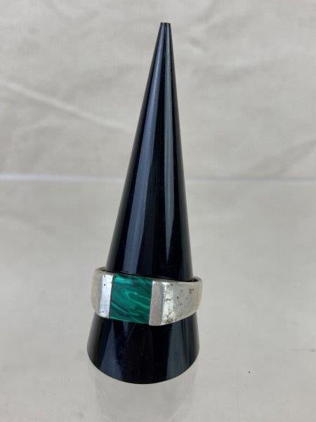 Sterling Silver Men's Malachite Ring: Striking sterling silver ring featuring an inlaid polished green malachite stone with vibrant natural banding. Stamped 925. Size 12 1/2. Total weight with stone: 7.1 grams. In good condition with ligh