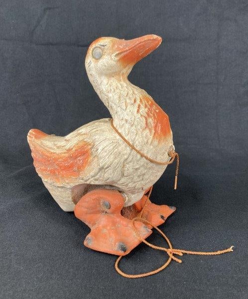 Norma Composition Wood Duck: Attractive decorative duck figure crafted in composition with finely molded detail and hand-painted surface. Measures approximately 8 1/2" H x 5" W x 8" D. In good condition with some paint loss consi