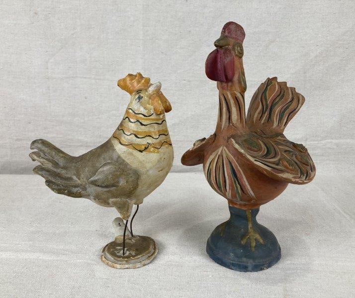 Folk Art Pottery Chicken Pair: Charming pair of independently crafted folk art pottery chickens featuring intricately painted designs and vibrant detailing. The largest measures approximately 10 1/4" H x 6 1/4" W x 5 1/2" D. Some p