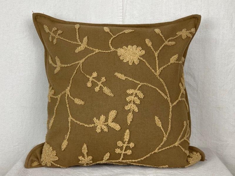 Embroidered Pillow: Beige pillow featuring an elegant floral motif embroidered on the front, made by Crate & Barrel. Measures approximately 16'' H x 15 1/4'' W x 6'' D. Good condition.